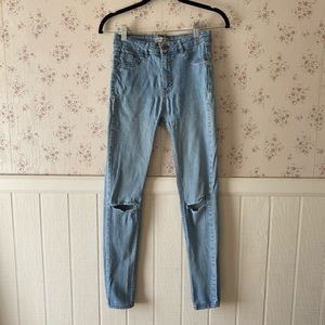 High waisted ripped skinny jeans